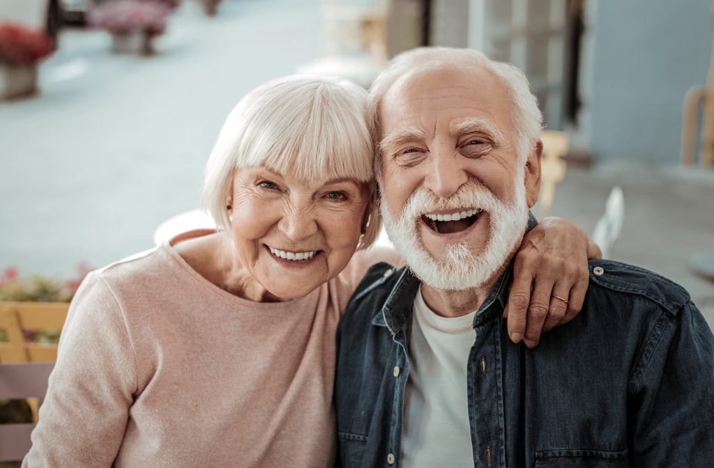 old couple sitting together and smiling