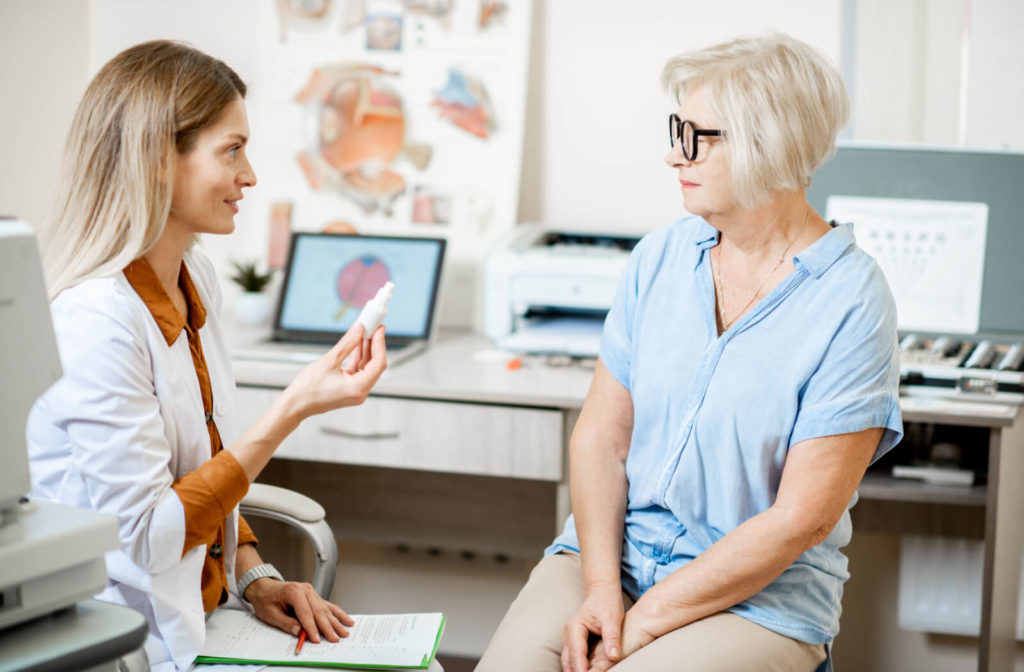 A patient at the eye doctor for a contact lens exam and fitting to ensure she is wearing the best contact lenses for her eyes.