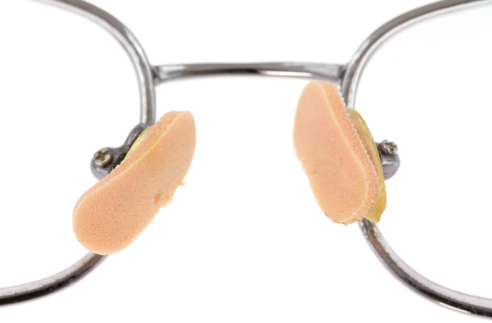 Adhesive pads have been affixed to the eyeglasses' nose pads, providing an extra layer of grip for enhanced comfort and stability.